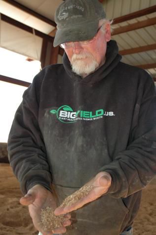 David Fry of Ozark Mountain Creamery shows the finely ground sawdust used in the bedded pack barn. Southwestern Missouri’s sawmills provide a steady supply of sawdust.Photo by Linda Geist
