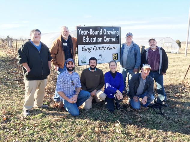 Fue Yang, left, and family operate the Year-Round Growing Education Center. Among those working with Yang: (back row) MU Extension horticulture specialist Patrick Byers, Lincoln University farm outreach worker David Middleton and MU Extension horticultureCourtesy of Webb City Farmers Market.