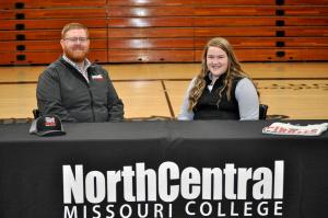 Jenna Hasekamp, right, with Jack Green, agriculture instructor and livestock judging coach at North Central Missouri College.
