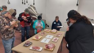 4-H youths identify cuts of meat at the 2023 Missouri 4-H State Meats Judging Contest.