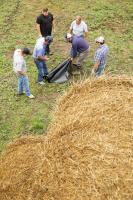 MU Extension agronomist Rusty Lee holds demonstrations to help livestock and forage producers learn how to use ammoniation to stretch short hay supplies during drought. MU Extension file photo.