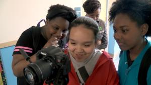 Foreground, from left: Johnson Elementary students Aliceia Brown, Marlyn Rodriguez and Amory McKnight. Background: Christine Hines, 4-H educational program associate.Jon Lamb, MU Extension
