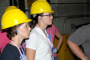 Montgomery County High School teacher Sara Johnson, left, and Wellsville-Middletown High School agriculture teacher Samantha Foster listen to their guide while touring the University of Missouri power plant during the Energy in the Classroom workshop in CJason Vance