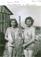 Howard Ramsey's aunts holding catfish, 1944.Photos courtesy of Mark Morgan and the Ramsey family