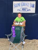 Haley Browning with her champion rabbits.Photo courtesy of Saline County Fair Board