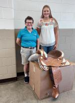 The MFA Saddle Award, sponsored by MFA Inc., was presented by Janice Spears, left, to Avery Ridgley of Montgomery County.