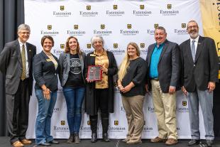 Pictured, from left, MU Vice Provost for Graduate Studies Jim Spain, extension dairy specialist Reagan Bluel, Barry County Extension Council member Lainey Harvick, council chair Becky Wogoman, MU Extension Southwest Regional Director Sarah Havens, extensi