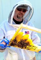 MU Extension agronomist and beekeeper Travis Harper teaches military veterans beekeeping skills as part of the Heroes to Hives program. He trains at three sites in Missouri, with a fourth to be added in the St. Louis area in 2024. Photo courtesy of Eric W