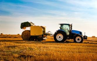 Tractor baling hay, I guess