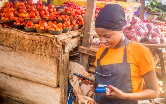 Woman at vegetable market
