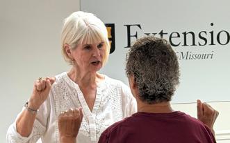 Two older women in a healthy aging class.