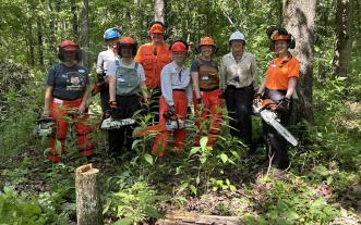 Women at chainsaw safety event