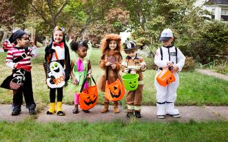 Kids in Halloween costumes
