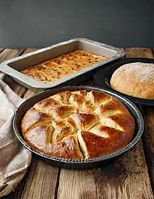 Baked goods in various sized pans.