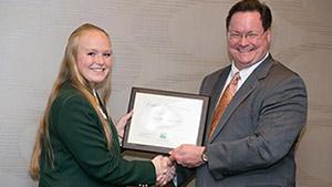 4-H volunteer receiving Naomi Crouch 4-H Volunteer Leadership Award