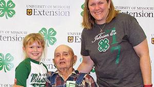 Family receiving 4-H Century Family award