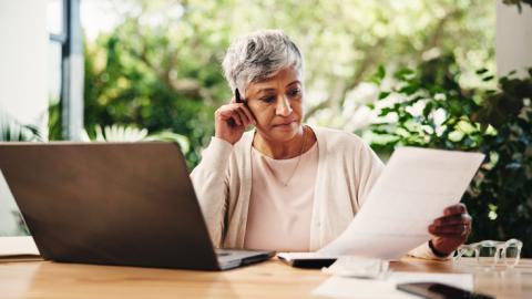 woman alone with finances