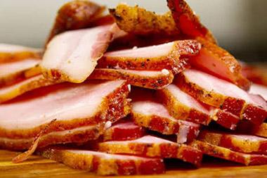 Close-up of pile of dry-cured bacon