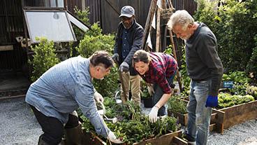 people gardening together