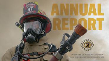 Firefighter in gear surrounded by smoke.