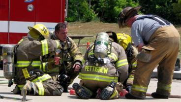 Firefighters doing an exercise.