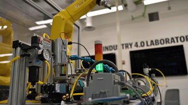 Workspace with robtic arm and other equipment