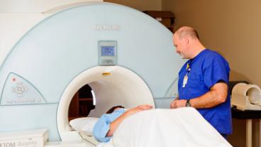 Person entering an MRI scanner