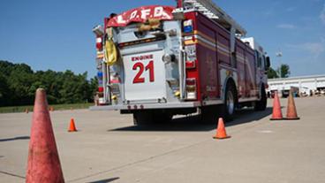 Firetruck in a cone driving course.