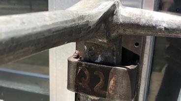 A bolt lock on a door.