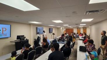 Youth sitting together during the Youth Empowerment Summit