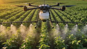 Drone flying over a field.