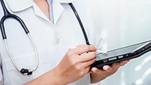 Doctor holding a tablet