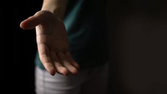 Hand reaching out to offer help.