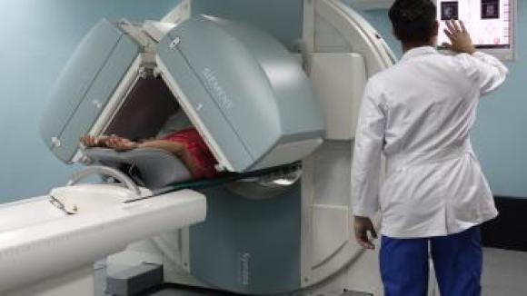 A doctor looking at scans.