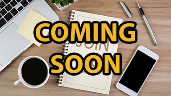 Desk with Coming soon text overlay