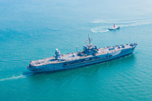 A Navy Battleship sailing across the ocean