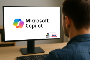 Microsoft Copilot logo and various other logos on a computer monitor