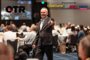 Steve Baker walking through a Conference