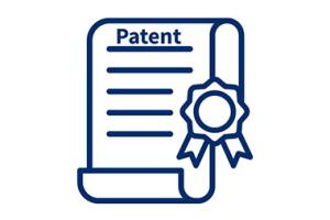 Icon of paper titled "Patent" with an award ribbon attached