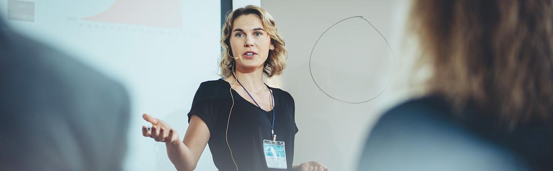 Woman presenting to audience