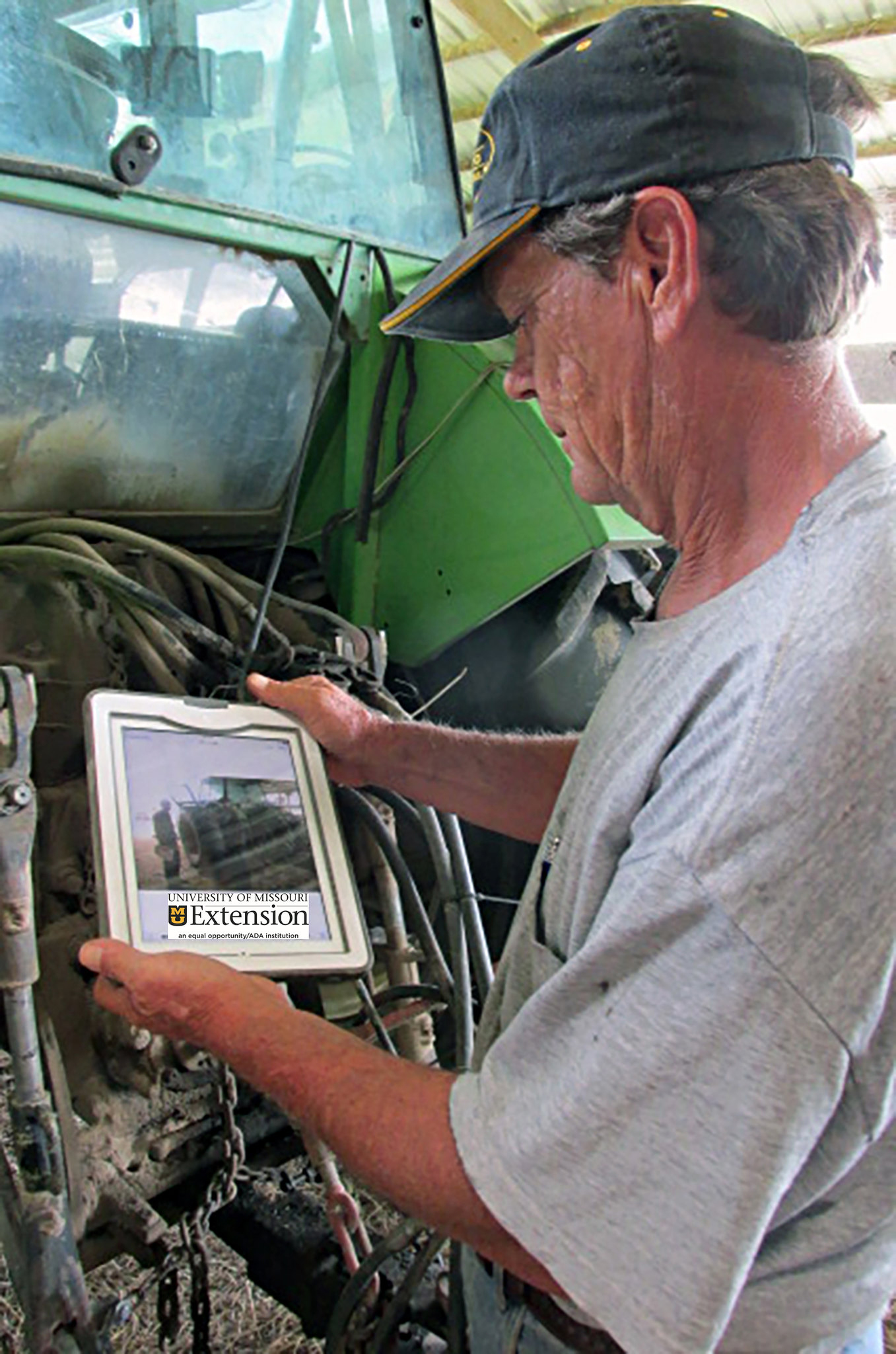 MU Extension specialists recommend that farmers use cellphones or tablets to communicate with workers and take pictures of broken parts to send to parts dealers. Photo by Linda Geist.