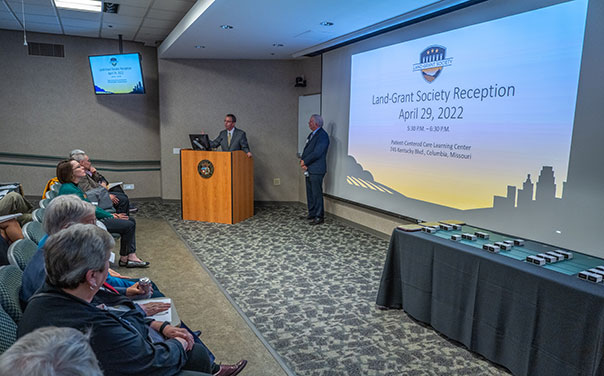 Marshall Stewart gives a presentation at a podium.