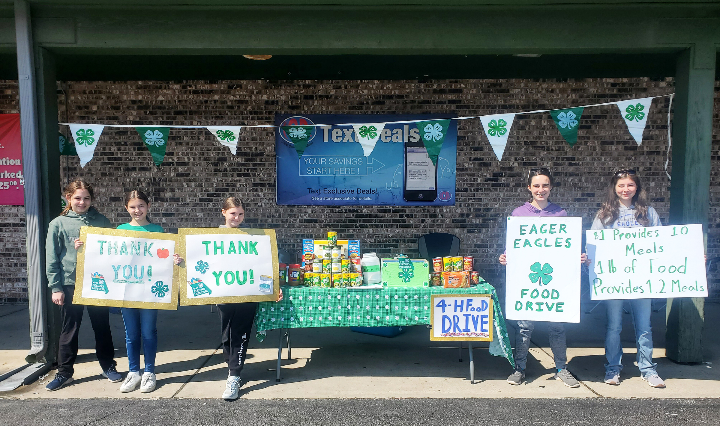 Some members of the Eager Eagles 4-H Club in Moniteau County at a food drive. Moniteau County 4-H’ers raised 51,459 meals in the 2023 4-H Feeding Missouri campaign, the most of any Missouri county.