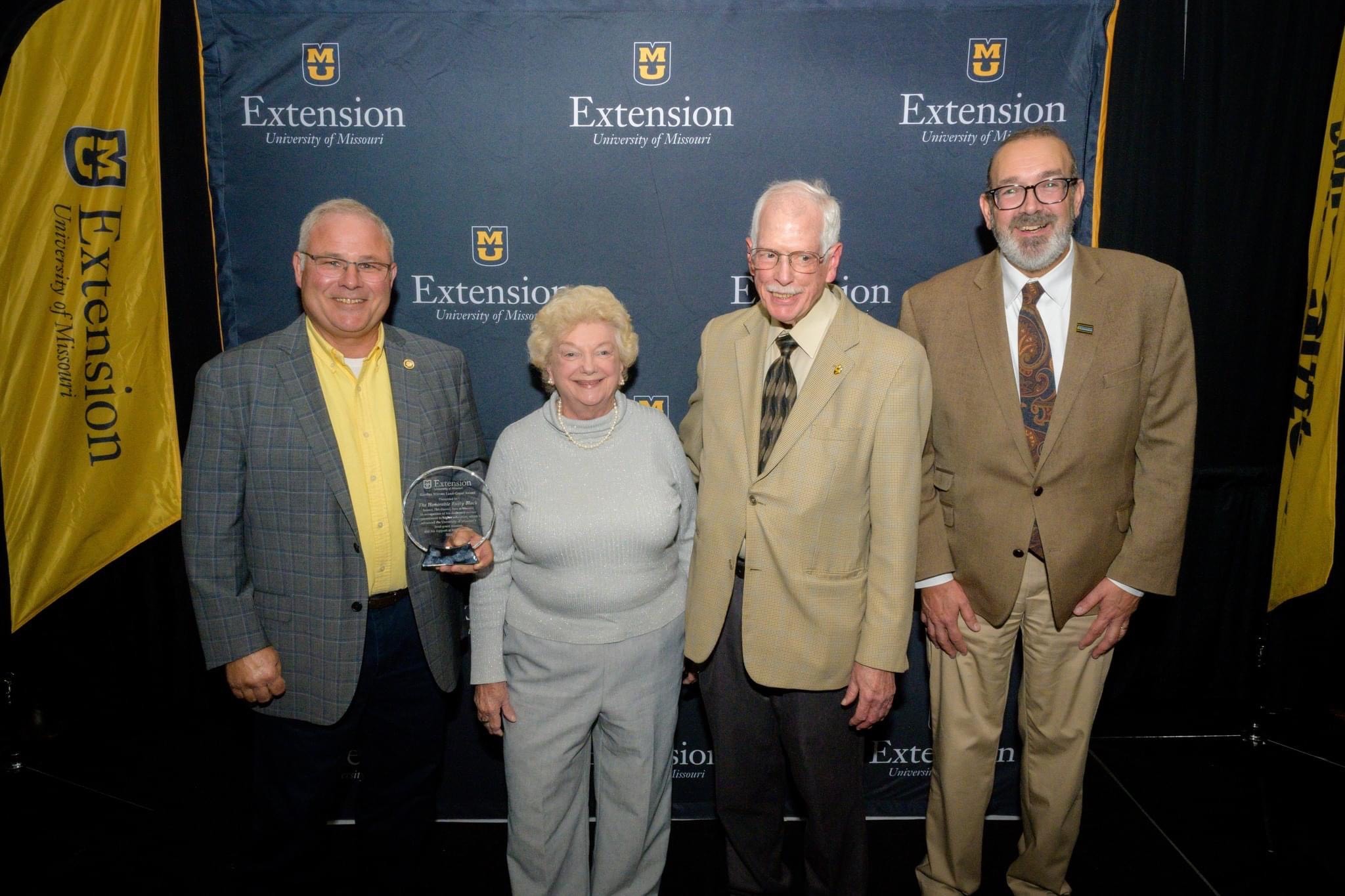 State Sen. Rusty Black, left, receiving the Gordon Warren Land-Grant Award.