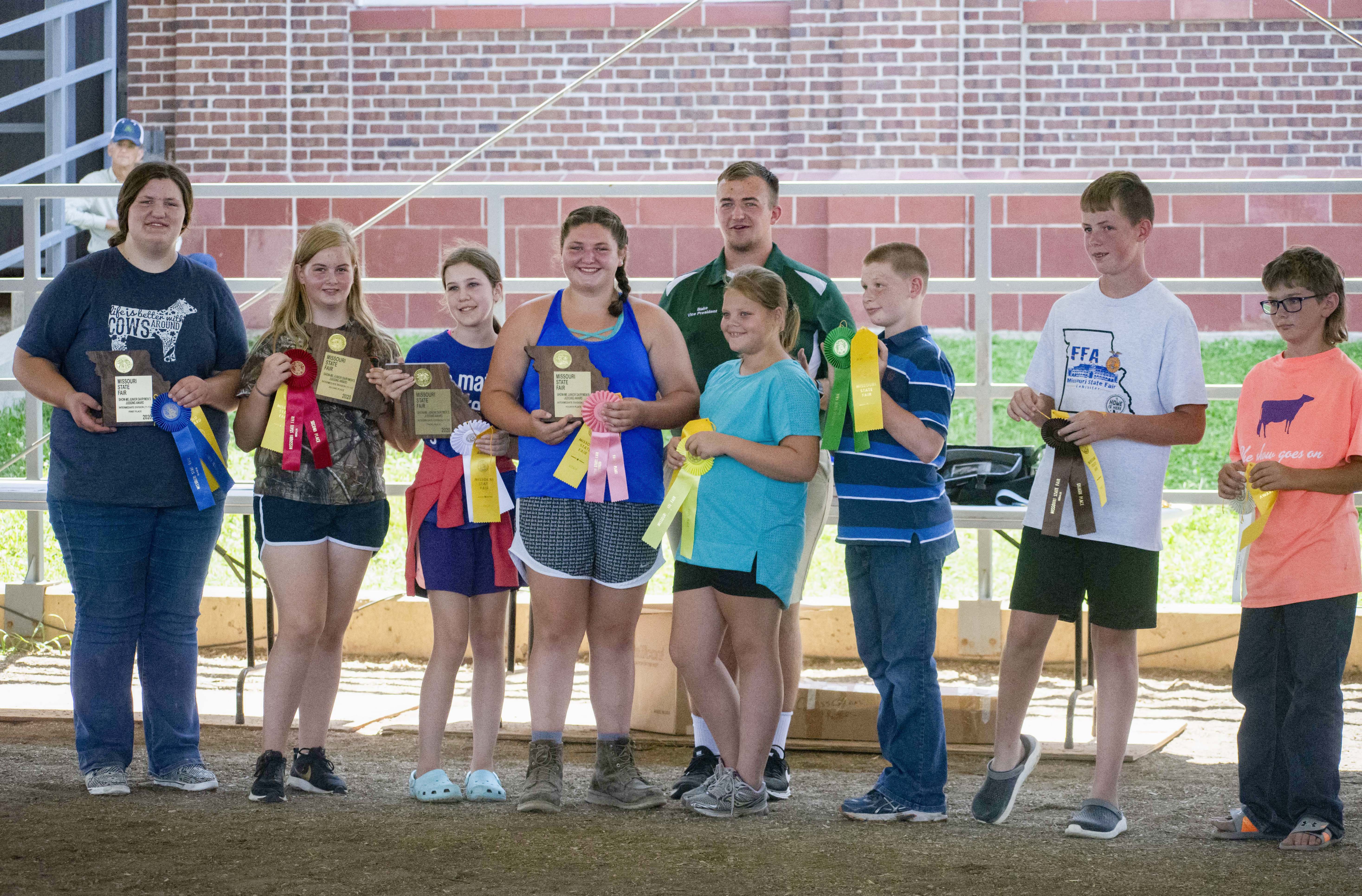 Top intermediate judges, l to r: Molly Archer, Monique Turner, Teagan Hardy, Maria Vedder, State 4-H Council Vice President Blake Wright, Sammi Justice, Blake Gates, Jackson Gunter and Travis Kriegel.