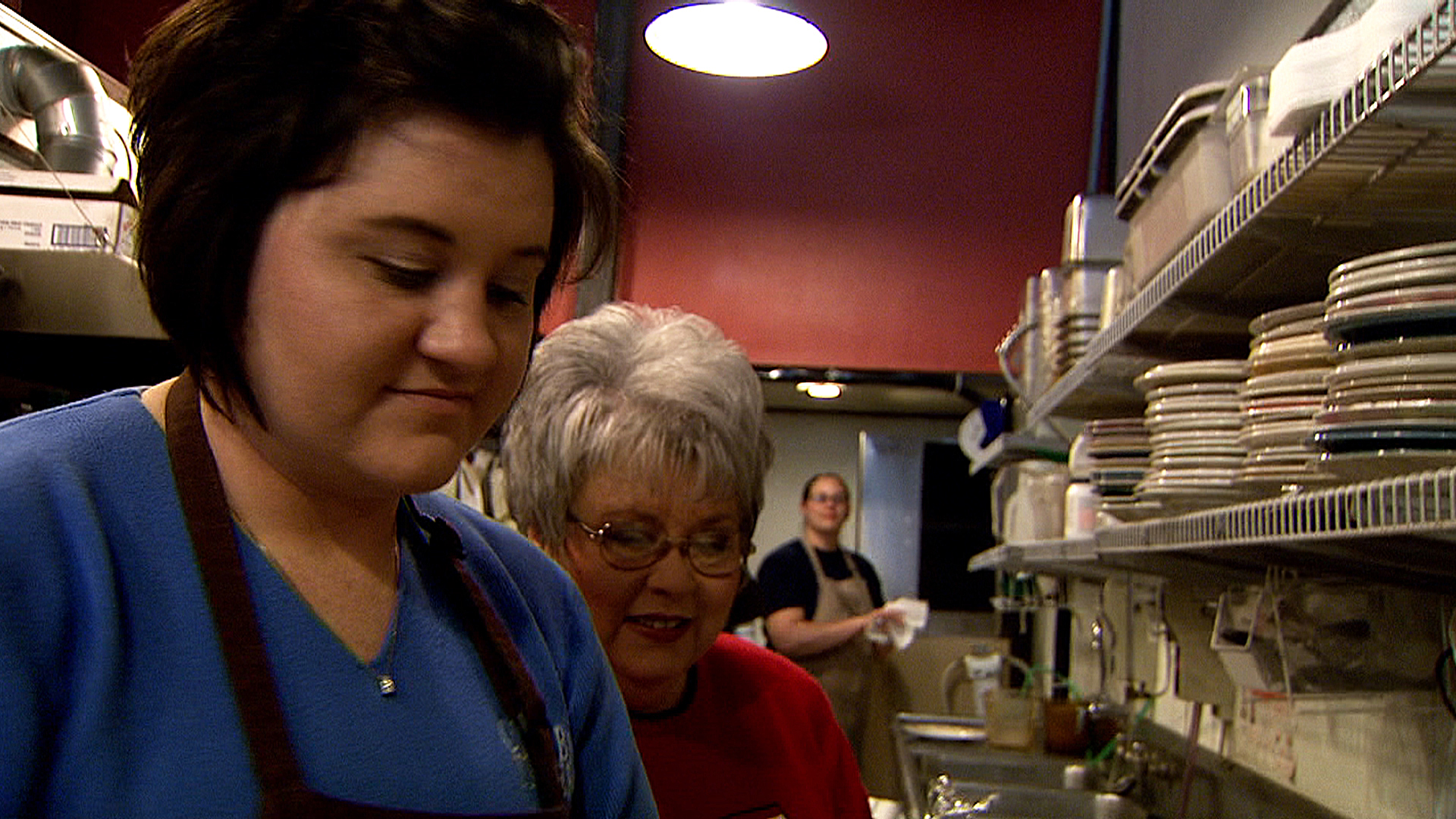 Laura Dudley (left) and mother Crystal Harrington work behind the counter at Columbia Traders restaurant in Joplin, Mo.University of Missouri Cooperative Media Group