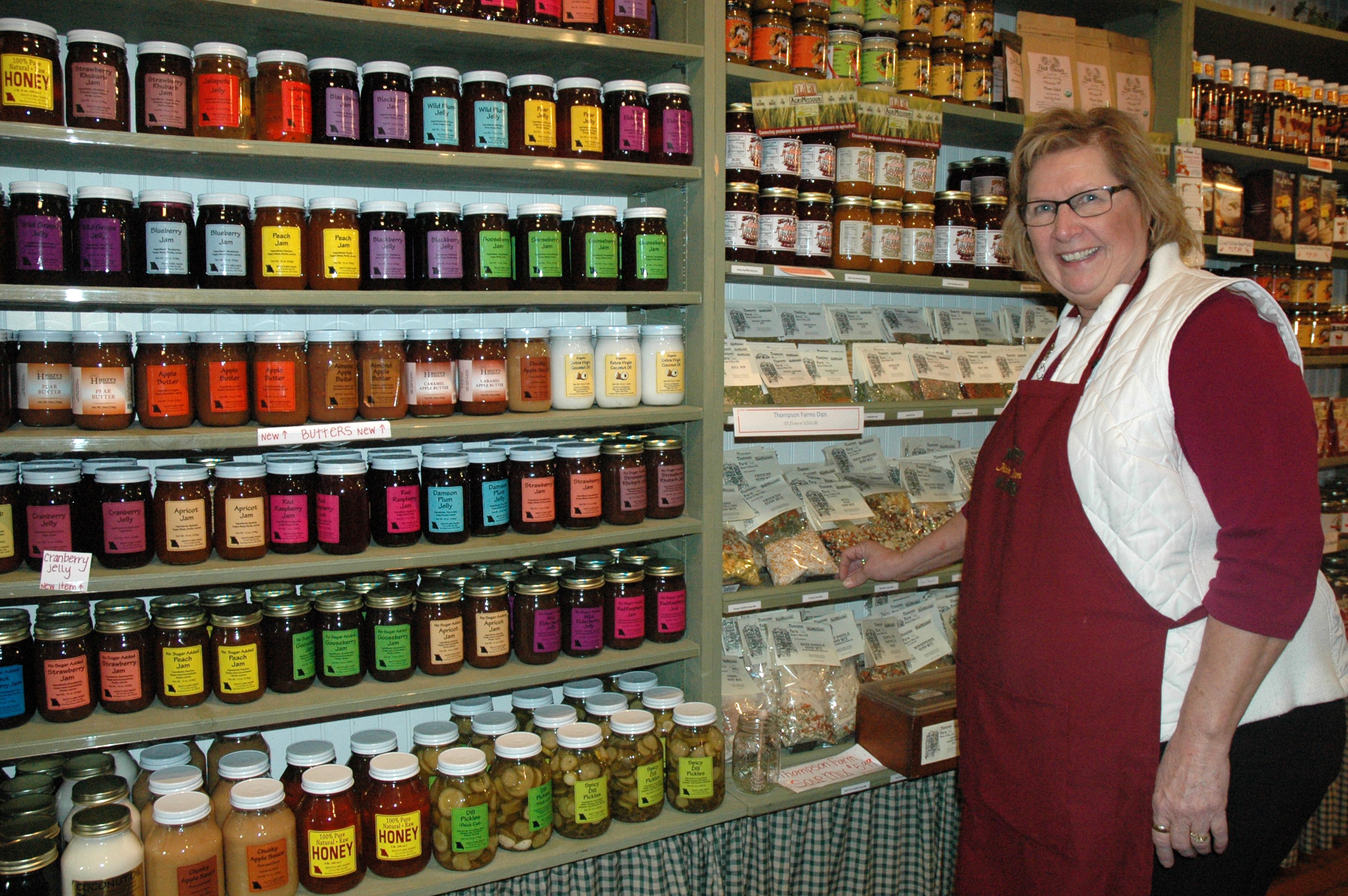 Mississippi Marketplace owner Linda Studer offers a wide array of products made or grown in Missouri.  She enjoys promoting quality Missouri products and other Hannibal downtown businesses. Photo by Linda Geist