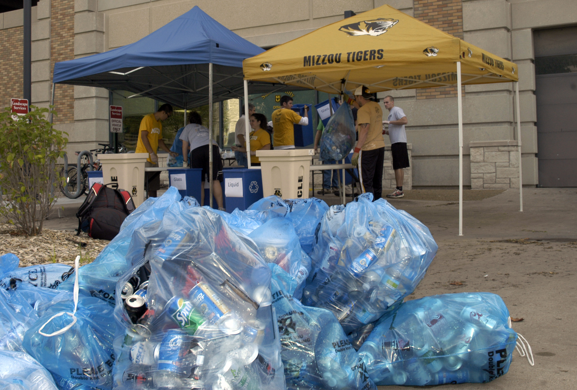 Students weighed and examined game-day trash outside the MU Sustainability Office. Curt Wohleber/MU Cooperative Media Group